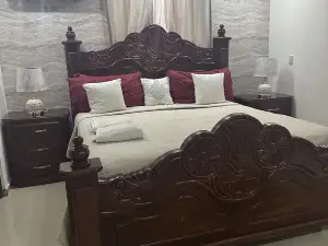 Lovely  and cozy home with pool and GYM. Located near major Bars and Restaurants