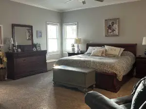 Charming spacious home nestled on a private lot minutes away from the Masters