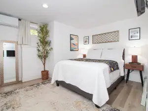 Central 2BR, Garden Suite, Top Amenities & Care!