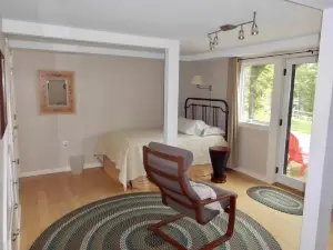 Beautifully appointed lake-view cottage with dock access