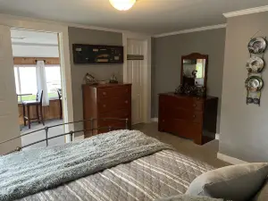 The Inn at Highland Lake, 2nd Floor, waterfront yard with a boat dock