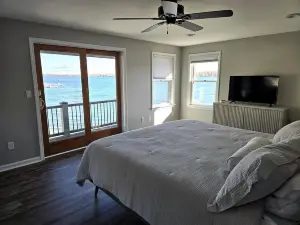 Spacious 4-bedroom house on Conesus Lake. 110 feet of lakefront with hot tub