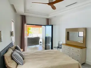 Two bedroom two bathroom stylish newly constructed ocean view with private pool.