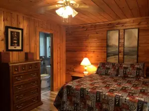 Lakefront rustic log cabin. Any season vacation, get away, or retreat.