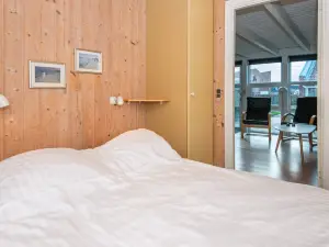 6 person holiday home on a holiday park in Hemmet