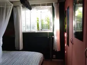"Tempat Senang" Chalet on the Beautiful Veluwe with Airco Sauna BBQ Jacuzzi Beamer and Dog