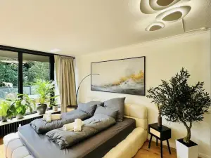 Velmora Boutique Suites - Wellness - Pool, Sauna, E-Bikes direkt am Strand