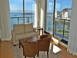 Apartamentos Turísticos Playa de Osmo