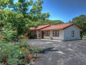 4-bedroom house in Utopia with 450’ of private crystal clear Sabinal river front