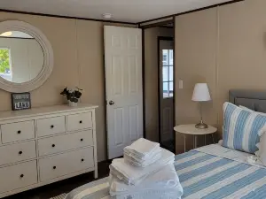 Waterfront mobile home on beautiful Lake Gaston with private pier access.
