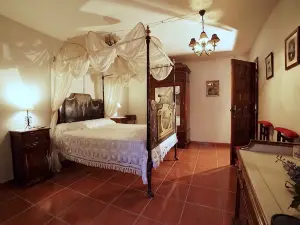 Palacete Magistral Domínguez Habitaciones