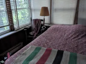 Direct lakefront cottage with wood burning fireplace in great room. Pet friendly