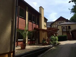 茨威爾格施羅森餐廳酒店