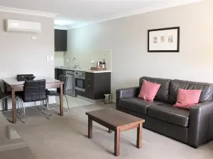 Carlyle Suites & Apartments