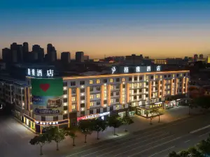 GreenTree Hospitality Group - (Gya)