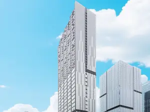 Junyi Scenic Apartment Hotel (Shilaoren International Exhibition Center)
