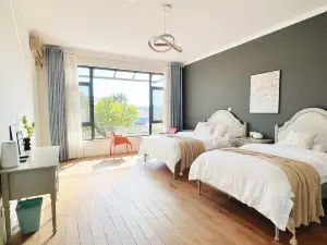 Mile Qixinsu Homestay (Huquan Ecological Park)