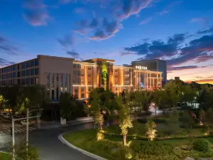 Xingang Holiday Hotel(Xinzheng International Airport Shop)