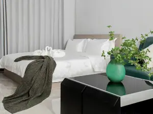 Longkou Jinli Serviced Apartment Hotel (Longhu Tianjie Poly Plaza)