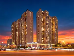 墨徳ホテル（コルラ杜鵑河市役所）