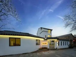 Dongdi Xinting Riverview Courtyard Beauty Inn (Youbu Ancient Street Store)