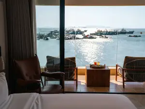 湄嶼宿集・夕岸日没海景ビーチ民宿