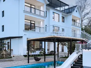 Qushanye · Moganshan Family Stream Tracing Wenquan Vacation Boutique Stay (Yulinba Branch)