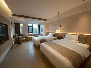Qiaoxiang Retu Hotel (Yuanjiang Station)