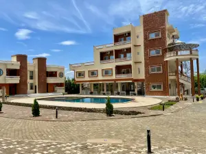 SALLY BEACH HOTEL YENNE