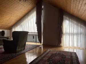 Sunny Wooden Loft with Large Windows