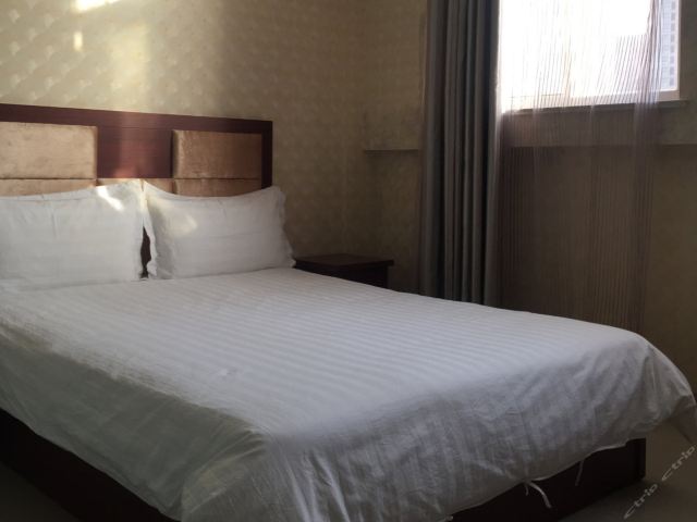 淮安新车站宾馆-大床商务间