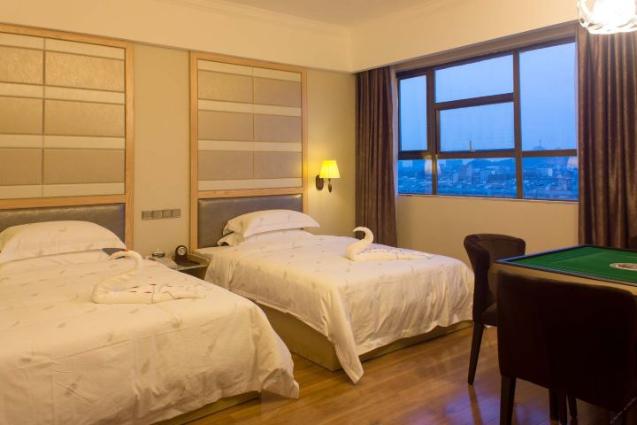 武宣天天假日酒店-臻品休闲房[含早]