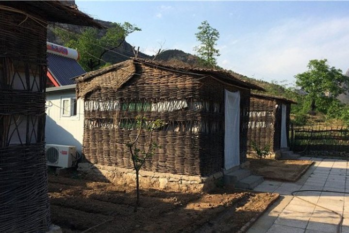 【北京十渡原始部落农家院团购】北京十渡原始部落农家院(特色草房)