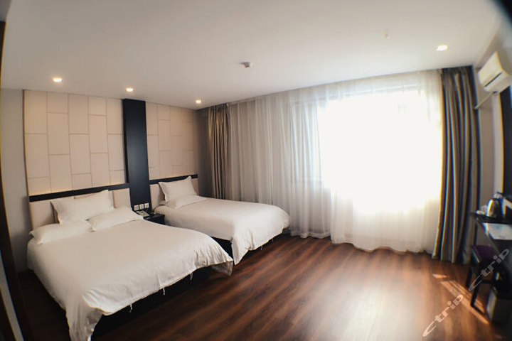 怡莱酒店(天津塘沽火车站店)-家庭房