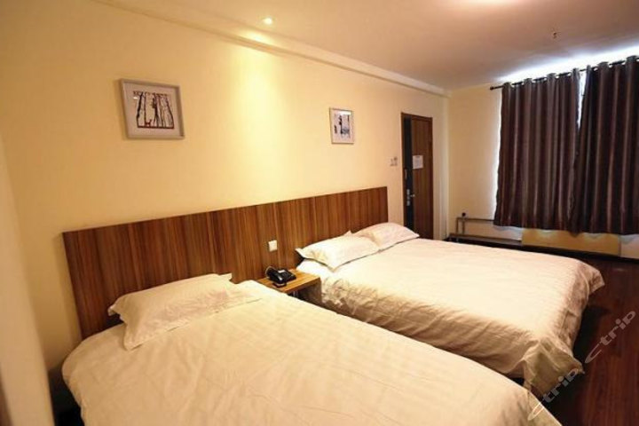 价值169元的石家庄晋州市九九客栈入住1晚,商务大床房/商务标准间2选1