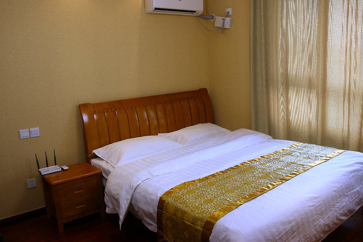 青岛金沙滩六人行度假公寓-园景双卧套房